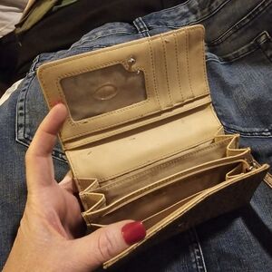 Medium-sized tan Guess wallet/ wristlet